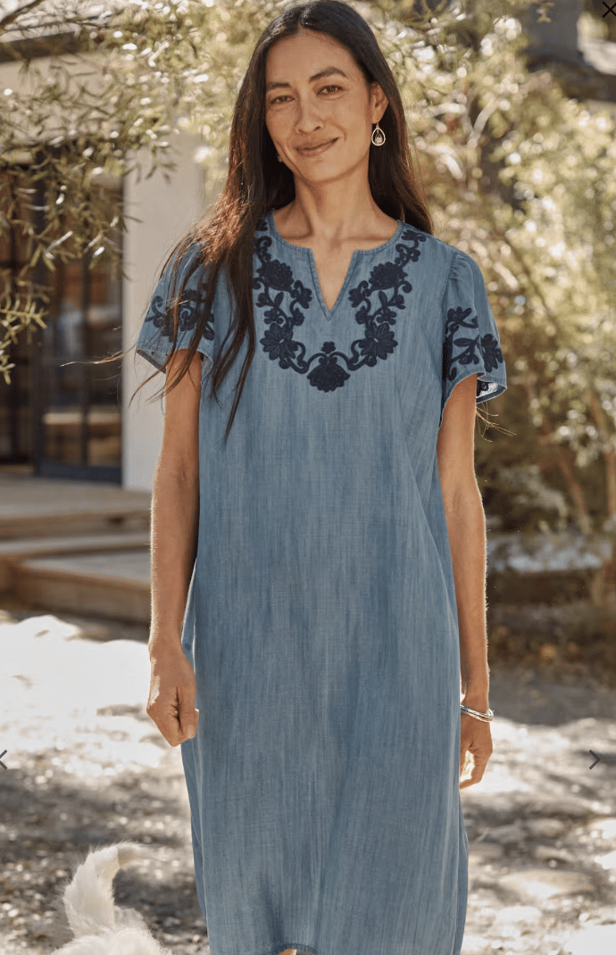 Breathable embroidered flutter sleeve dress, best graduation outfit ideas for warm weather.